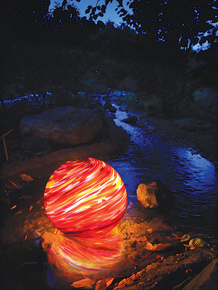 Eighteen inch Phobos nightorb in stream colored lighting