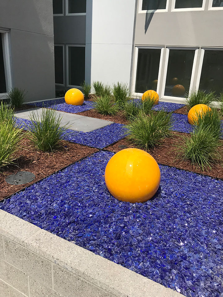 Five 24 inch Golden Nightorbs on Blue glass at Town Center Sunnyvale, CA